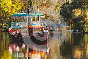 Smart pleasure boat floats in the middle of the river