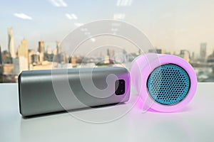 Smart portable music speaker light in pink purple color with wireless bluetooth speaker