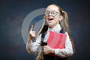 Smart Schoolgirl Hold Book Point Index Finger up