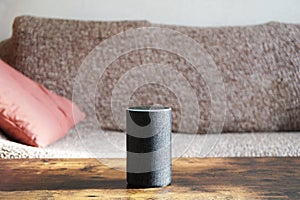 Smart speaker standing on coffee table
