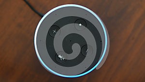 Smart speaker top view artificial intelligence assistant voice control blue ring