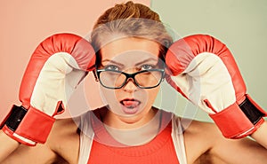 Smart strong and sexy. Super woman concept. Successful womanhood. Woman boxing gloves adjust eyeglasses. Strength and