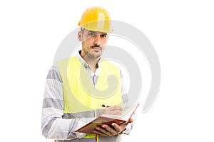 Smart successful engineer or builder holding agenda and writing