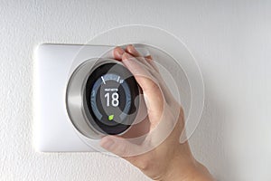 Smart Thermostat with a hand saving energy