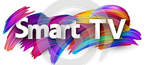 Smart TV sign with colorful brush strokes.