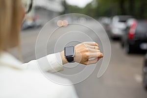 Smart watch on womans wrist photo