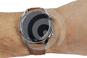 Smart watch worn on the hand, close-up on a white background. Isolate