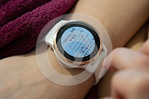 The smart watch is wrapped around the arm