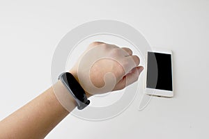 Smart watch in the wrist of women isolate white background