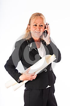 Smart woman on the jobsite talking on the phone