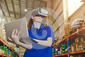 smart worker using modern advance technology digital VR device to control operate manage industry products stock warehouse