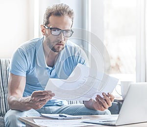 Smart Young Businessman in Casual Clothes at Home.