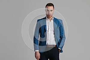 Smartcasual fashion model holding hand in pocket