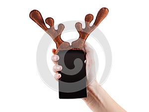 Smartphon christmas funny concept, reindeer antlers toy, Isolated on white