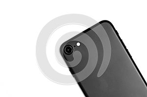 Smartphone black matte detail of back with camera and flash isolated on white background