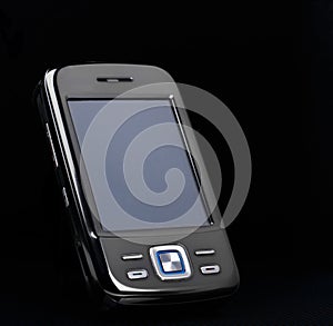 Smartphone with blank screen on black background