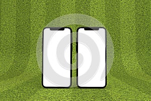 Smartphone with a blank white screen on a green sports pitch. 3D Rendering