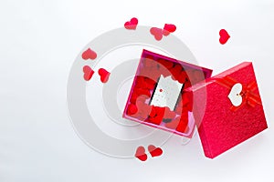 Smartphone with calendar at Valentine`s day date in gift box