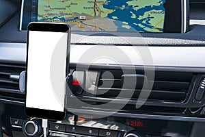 Smartphone in a car use for Navigate or GPS. Driving a car with