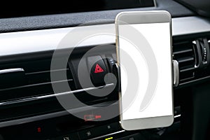 Smartphone in a car use for Navigate or GPS. Driving a car withSmartphone in a car use for Navigate or GPS. Driving a car