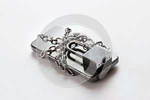 Smartphone with chain locked on white background