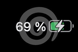 Smartphone charged battery level indicator - sixty-nine percent: close up macro