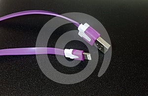 Smartphone Charger Cable on black background