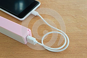 Smartphone charger with powerbank