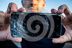 A smartphone with a cracked screen