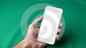 The smartphone features a white frame typical of modern devices