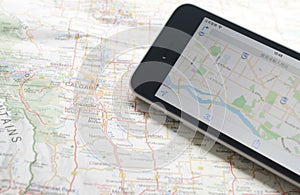 Smartphone with GPS navigator on map