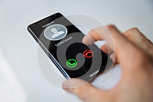 Smartphone with incoming call from unknown person