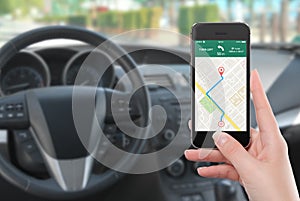 Smartphone with map gps navigation app on the screen in female h