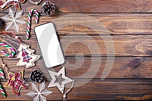 Smartphone mock up with rustic Christmas decorations