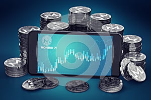 Smartphone with Monero growth chart on-screen among piles of Monero coins