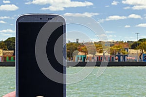 Smartphone at Porto Seguro coast photo