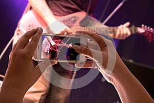 Smartphone recording a musical presentation