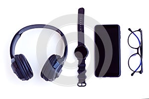 Smartphone,Smartwatch,Black Headphone and Eyeglasses on White background