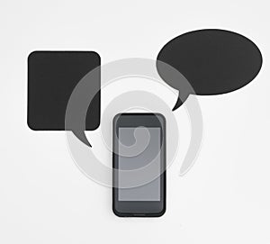 Smartphone and speech bubbles with copyspace