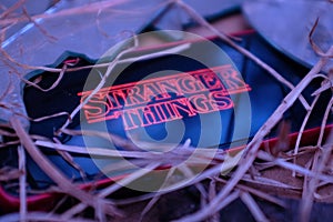 Smartphone with the Stranger Things logo. Stranger Things