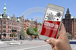 Smartphone with tracking app and covid-19 corona virus