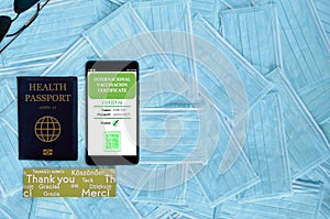 Smartphone with valid digital vaccination certificate COVID-19.Inmunity passport, health and surveillance concepts. Fake