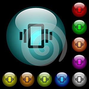 Smartphone vibration icons in color illuminated glass buttons