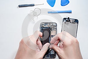 The smartphone was damages and need to repair which tools smartphone that stand on white background