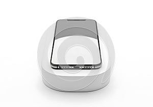 Smartphone on wireless charger isolated on white background