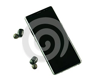 Smartphone with wireless headphones isolated white background