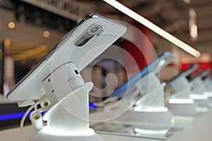 Smartphones are sold in an electronics store.