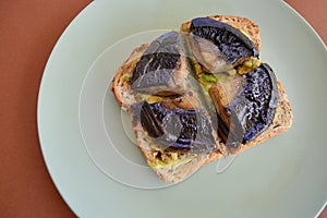 Smashed avocado on toast with portobello mushrooms