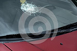 Smashed Car Windshield on Car Driving on Road
