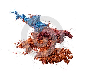 Smashed dark eyeshadows isolated on white background